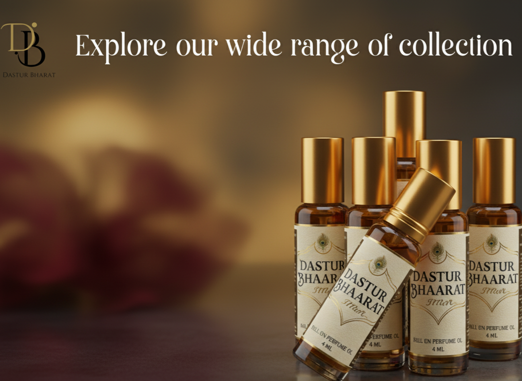 Dastur Bhaarat perfume bottles with gold caps on a reflective surface, blurred background